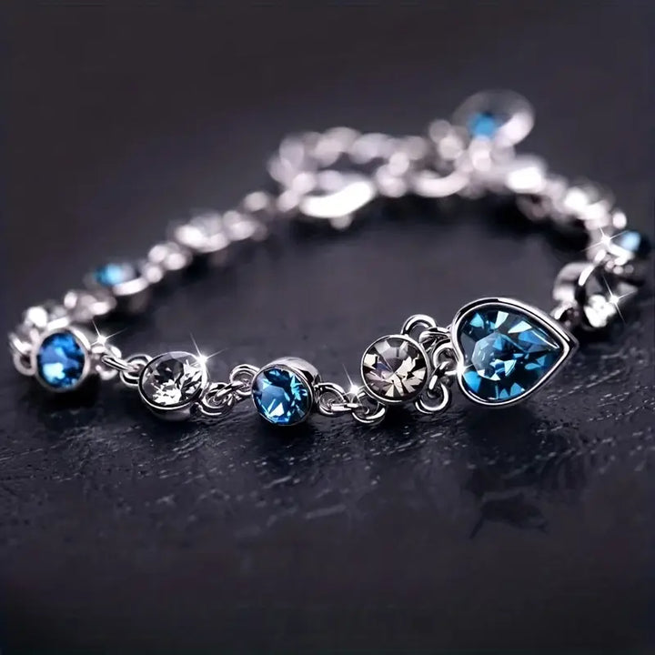 Soft shine white gold bracelet with little heart.