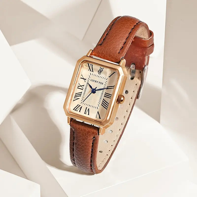 Elegant gold watch with a refined little stone