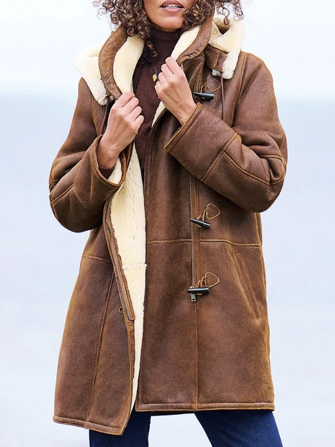 Timeless soft-lined brown winter coat with a flattering structured fit