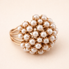 Ring with inlaid pearl accent
