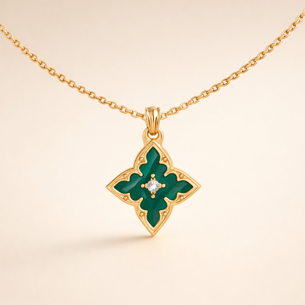Gold necklace with four-leaf clover