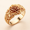 Pink gold blossom ring with delicate details