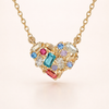 Elegant gold necklace with colourful little heart