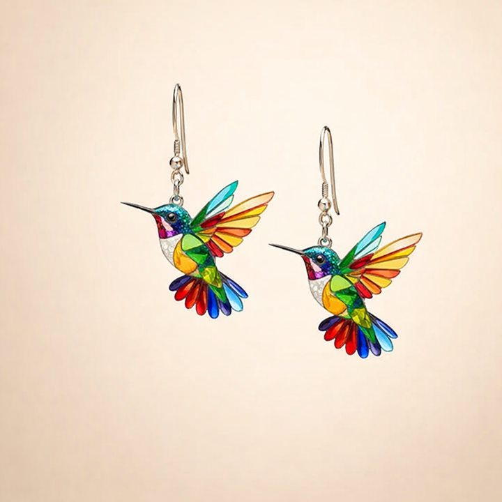 Elegant white gold earrings with colourful hummingbird