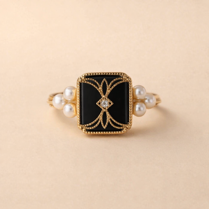 Elegant gold ring with antique black pearl