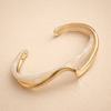 Soft gold bracelet with opal shine