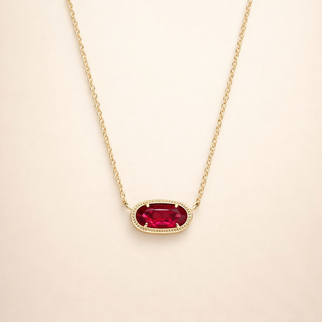 Elegant gold necklace with oval ruby