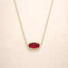 Elegant gold necklace with oval ruby