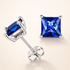 Elegant white gold earrings with princess-cut sapphire
