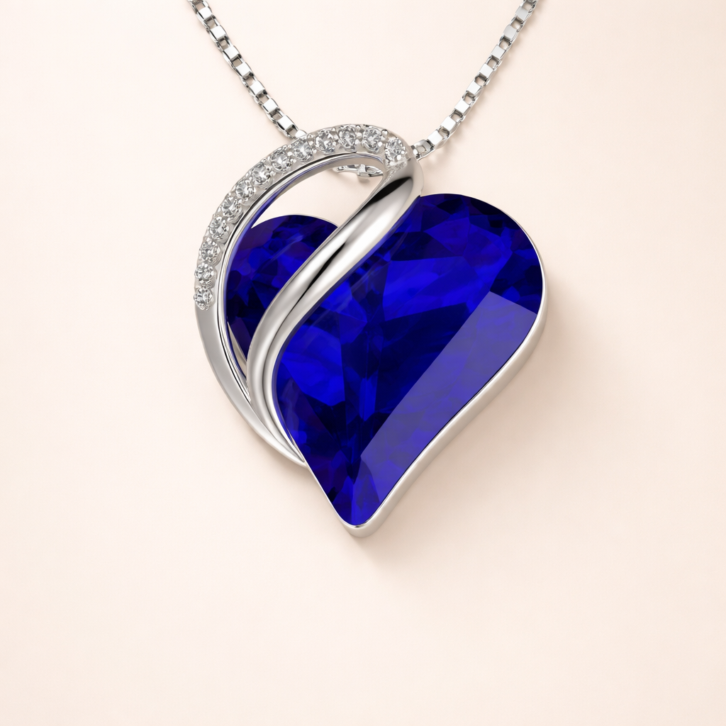 Endless heart pendant in white gold with sapphire