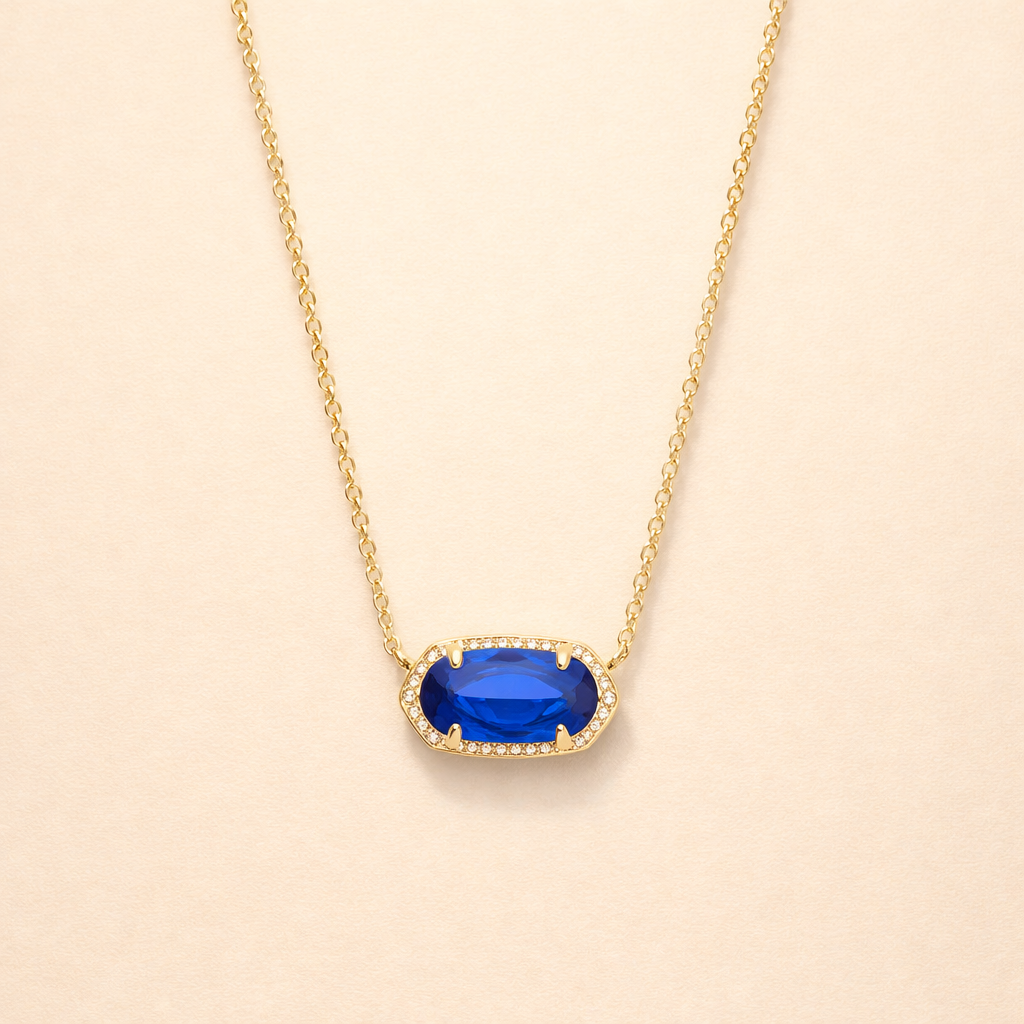 Elegant gold necklace with oval sapphire