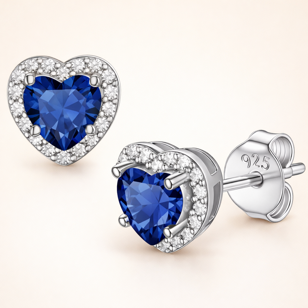 Elegant white gold earrings with sapphire heart