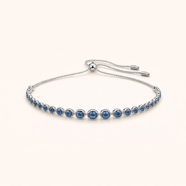 Elegant white gold tennis bracelet with cut sapphires