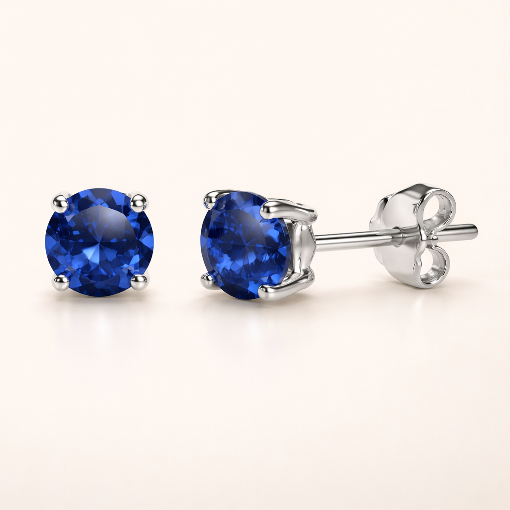 Elegant white gold earrings with sapphire details
