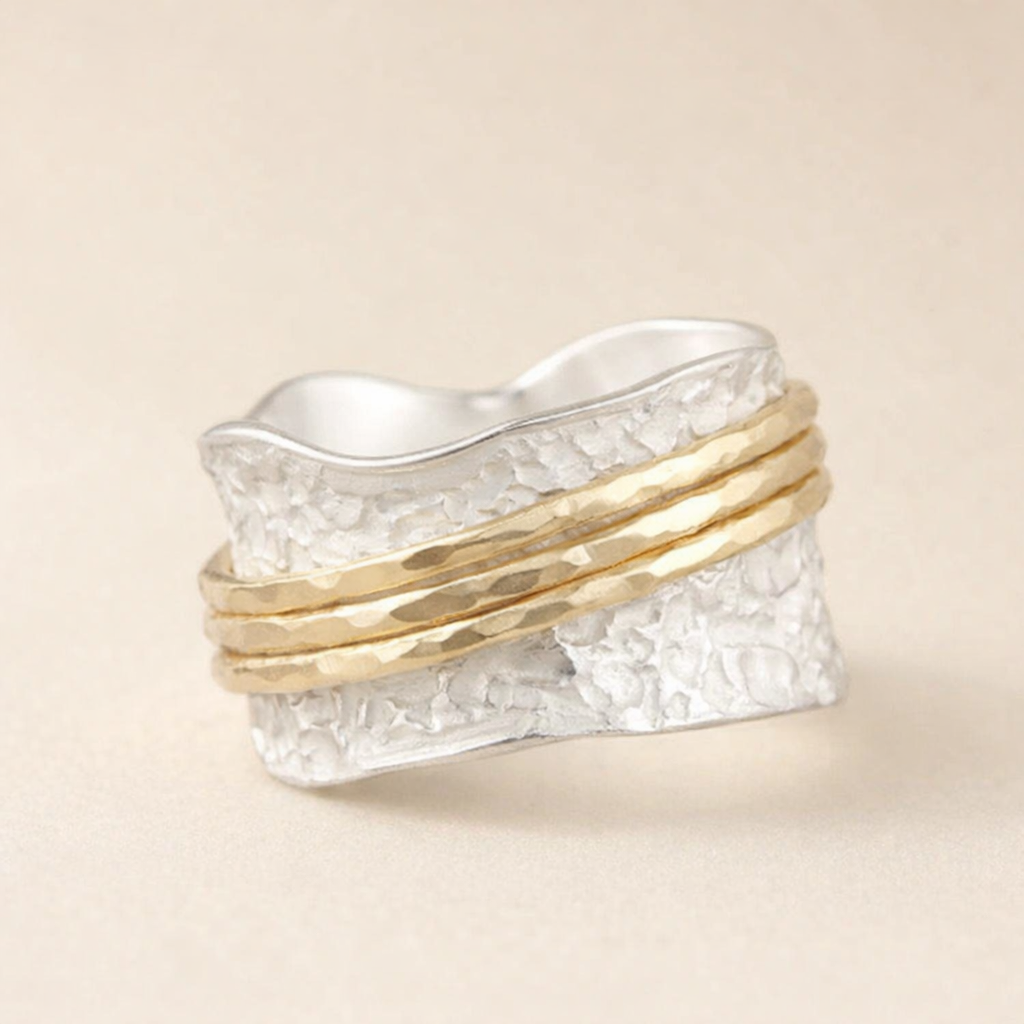 Elegant thin gold and silver ring with refined design
