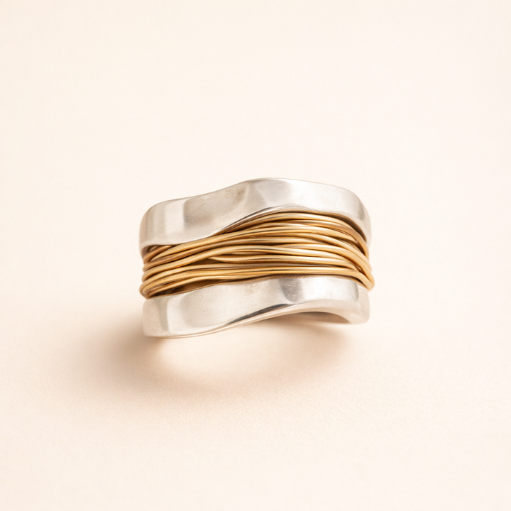 Elegant silver ring with refined gold accents