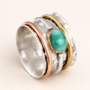 Elegant gold ring with turquoise and refined details