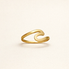 Elegant gold ring with wave pattern