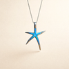 Silver necklace with blue opal and starfish detail