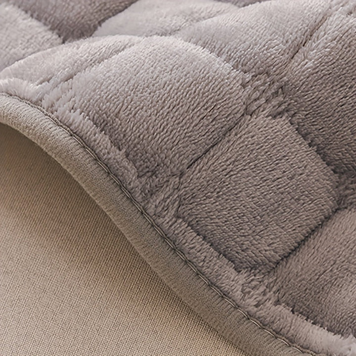 Elegant Quilted Sofa Cover – Comfort and Protection