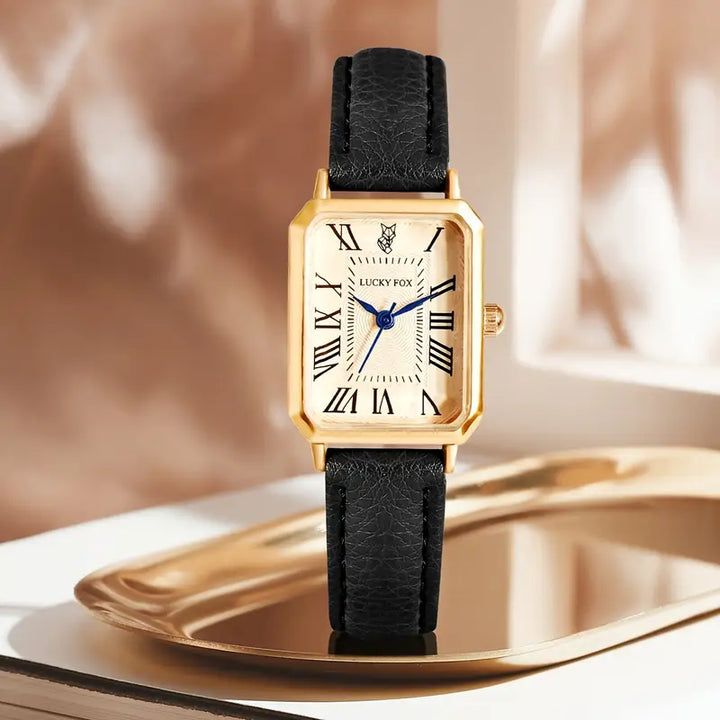 Elegant gold watch with a refined little stone