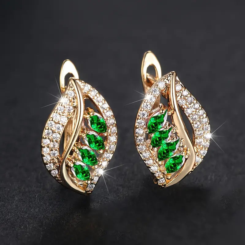Refined gold earrings with subtle leaves
