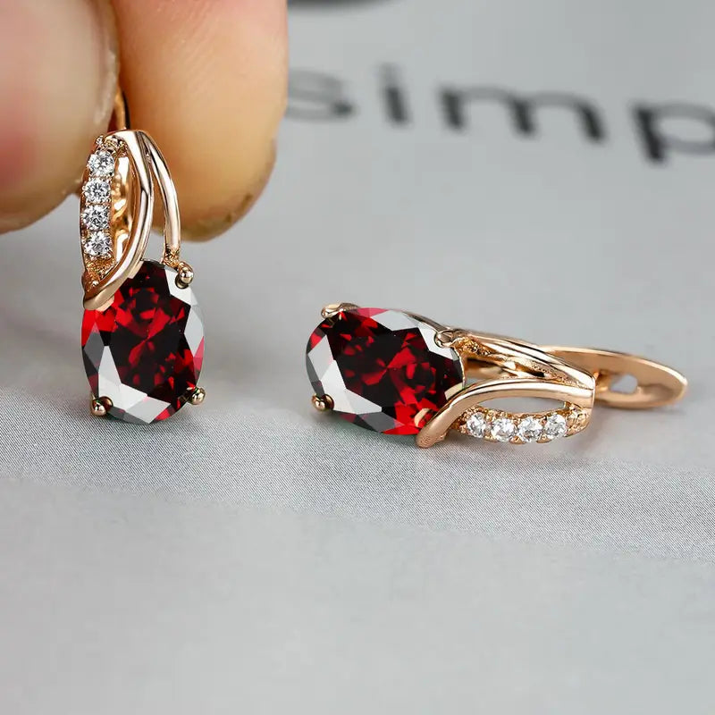 Elegant gold earrings with cubic zirconia stones