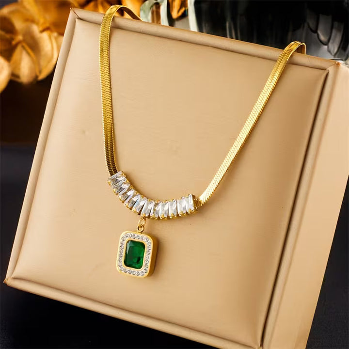 Elegant Gold Pendant with Emerald Prism