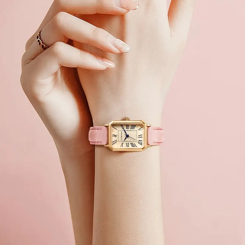 Elegant gold watch with a refined little stone