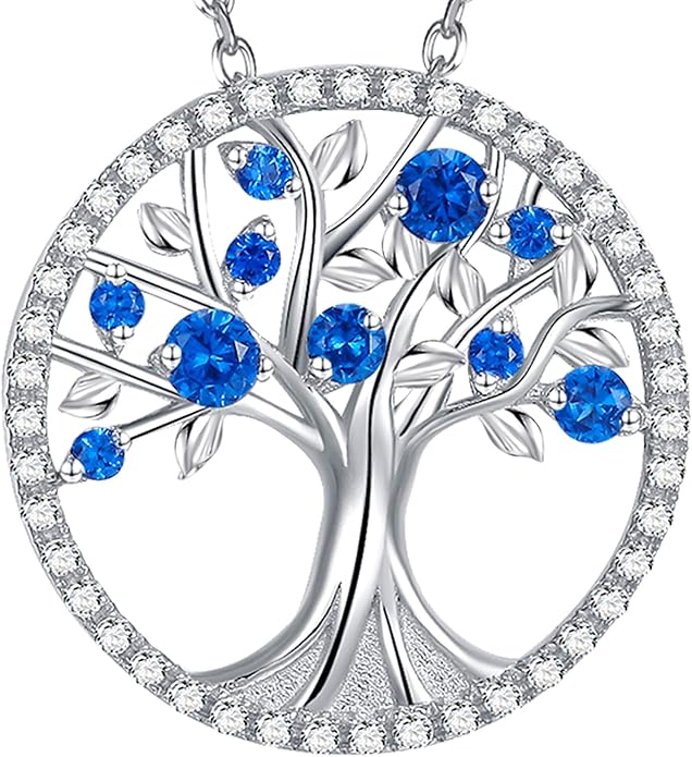 Elegant white gold pendant with sapphire and tree of life