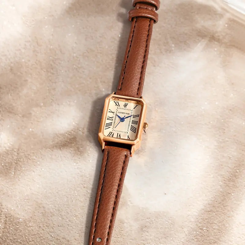 Elegant gold watch with a refined little stone