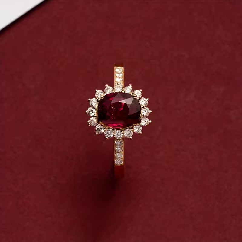 Elegant gold ring with red cubic zirconia