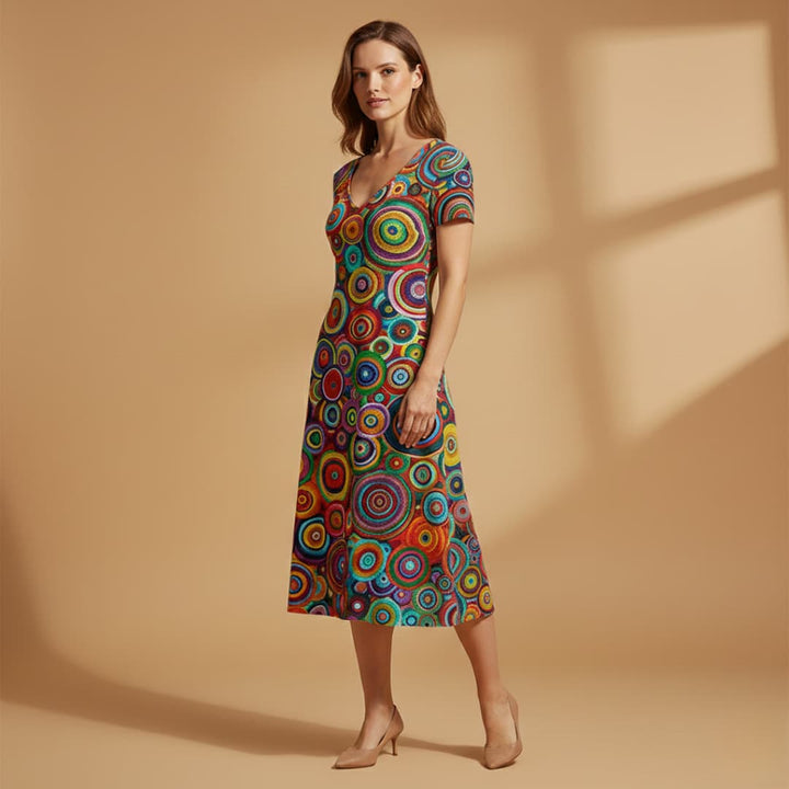 https://cdn.shopify.com/s/files/1/0973/8856/0715/files/ColourfulDresswithAbstractPattern_6.jpg?v=1770885906