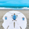 Silver earrings with opal seaweed details