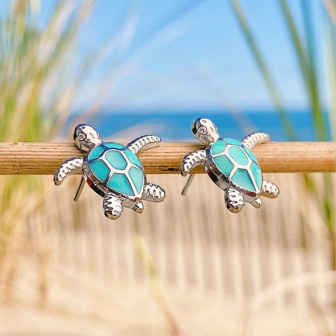 Silver earrings with opal in sea turtle design