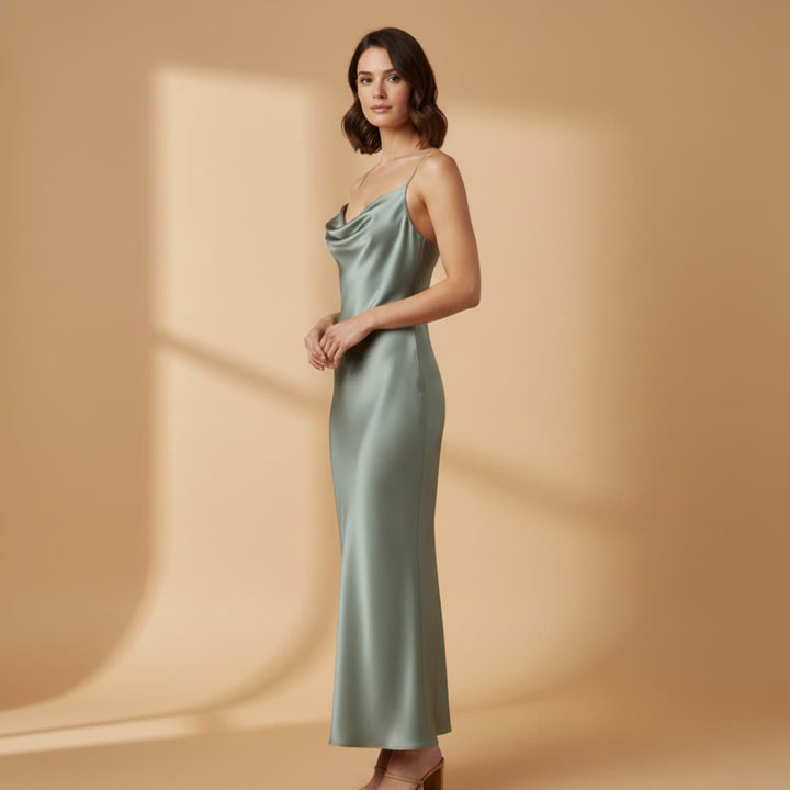 https://cdn.shopify.com/s/files/1/0973/8856/0715/files/ElegantSatinDressforWomenwithAdjustableStrapsandaFigure-HuggingFit_9.jpg?v=1770973462
