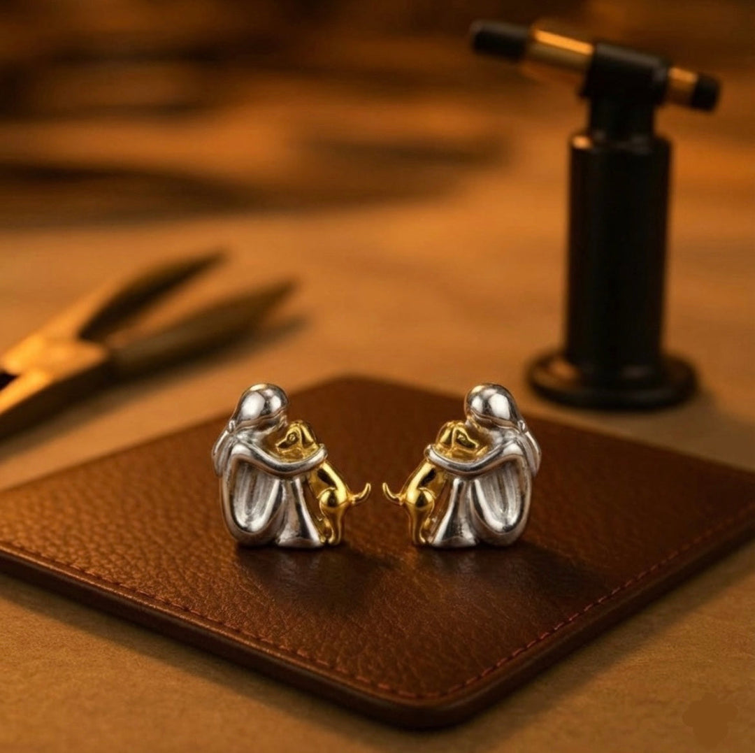 Minimalist silver earrings with subtle round shapes
