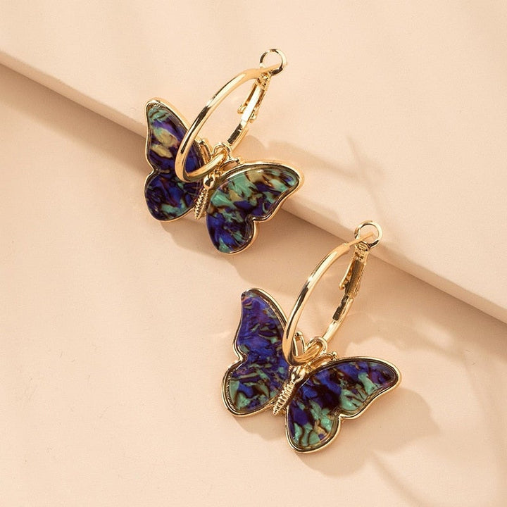 Butterfly earrings with colourful details.
