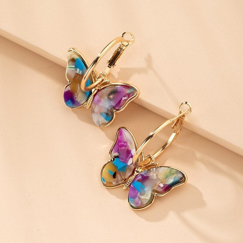 Butterfly earrings with colourful details.