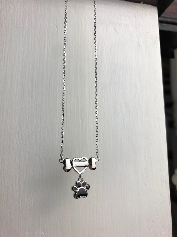 Delicate Dog Paw Pendant in Stainless Steel