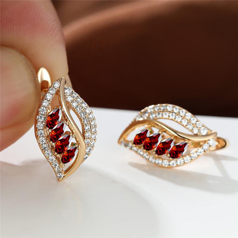 Soft gold earrings with a rosé shine