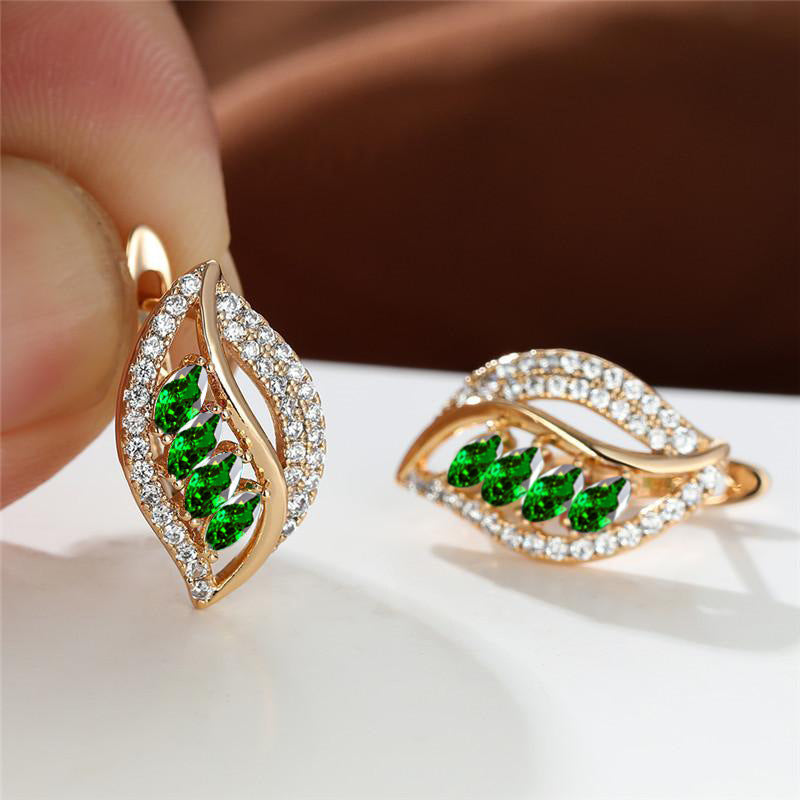 Refined gold earrings with subtle leaves