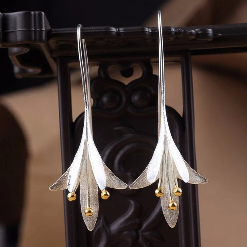 Soft Blossom Silver Earrings with Delicate Details