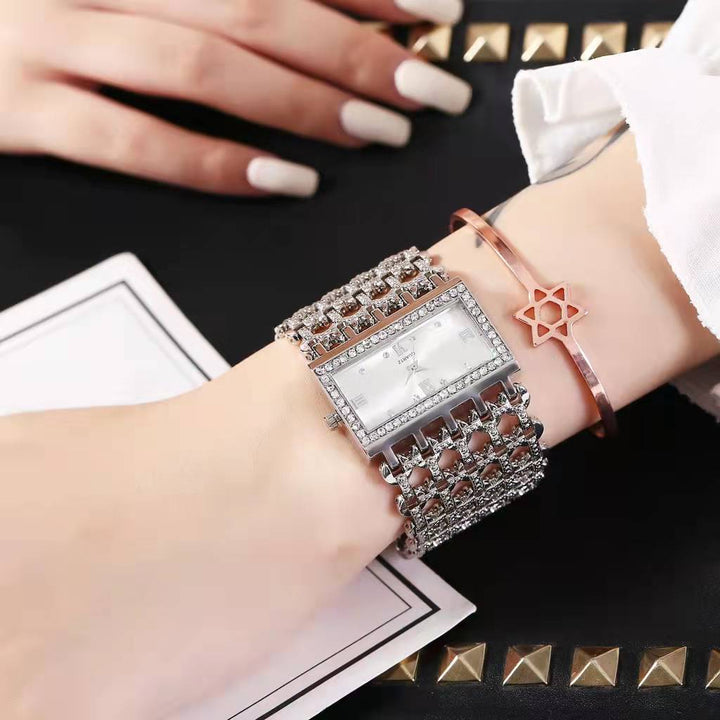 Minimalist rose gold watch with subtle link chain