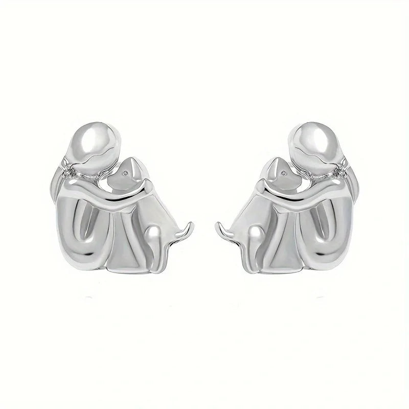 Minimalist silver earrings with subtle round shapes