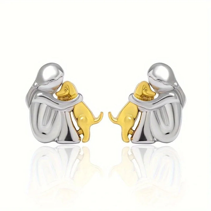 Minimalist silver earrings with subtle round shapes