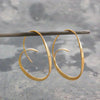 Elegant Gold Earrings with a Refined Spiral Shape