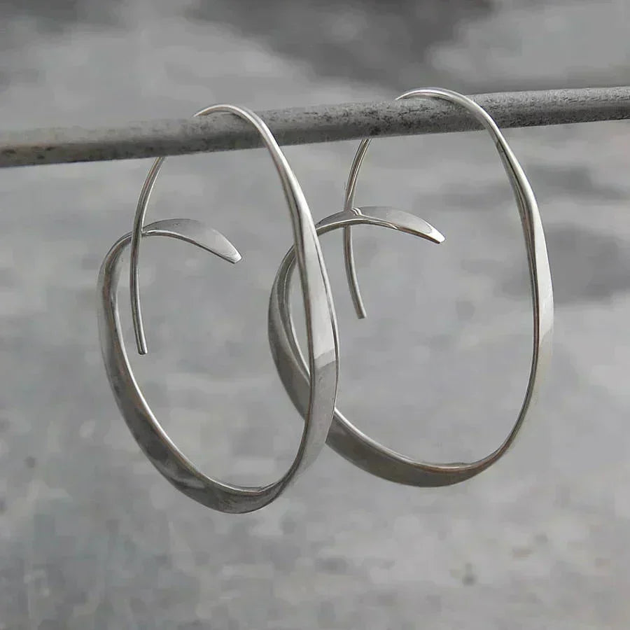 Elegant Gold Earrings with a Refined Spiral Shape