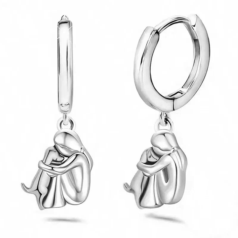 Minimalist silver earrings with little dog