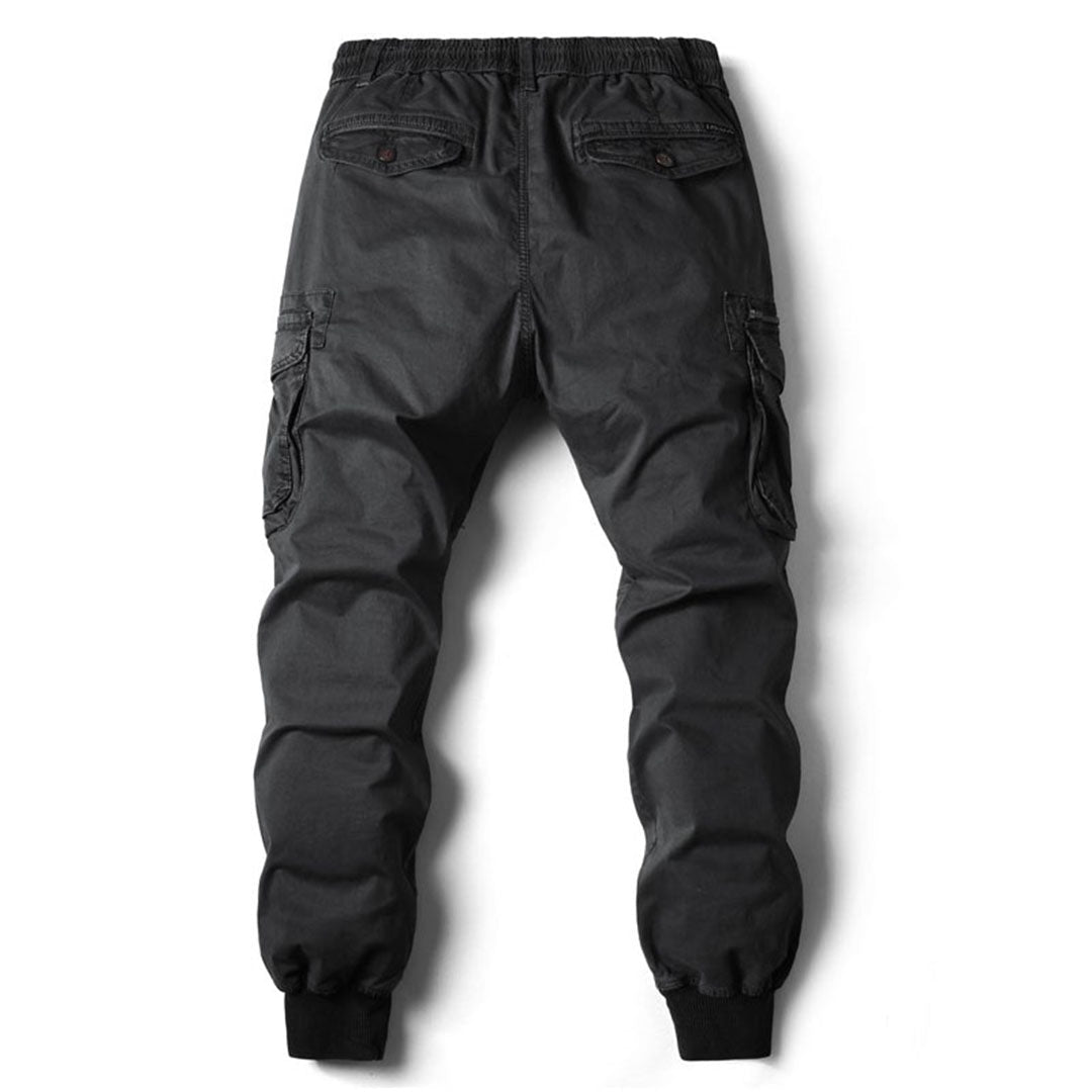 https://cdn.shopify.com/s/files/1/0878/4406/1529/files/VANGUARD-Langecargobroekvoorheren_400d8ecb-d995-494a-9514-2ac2cf8b07b9.jpg?v=1772202271